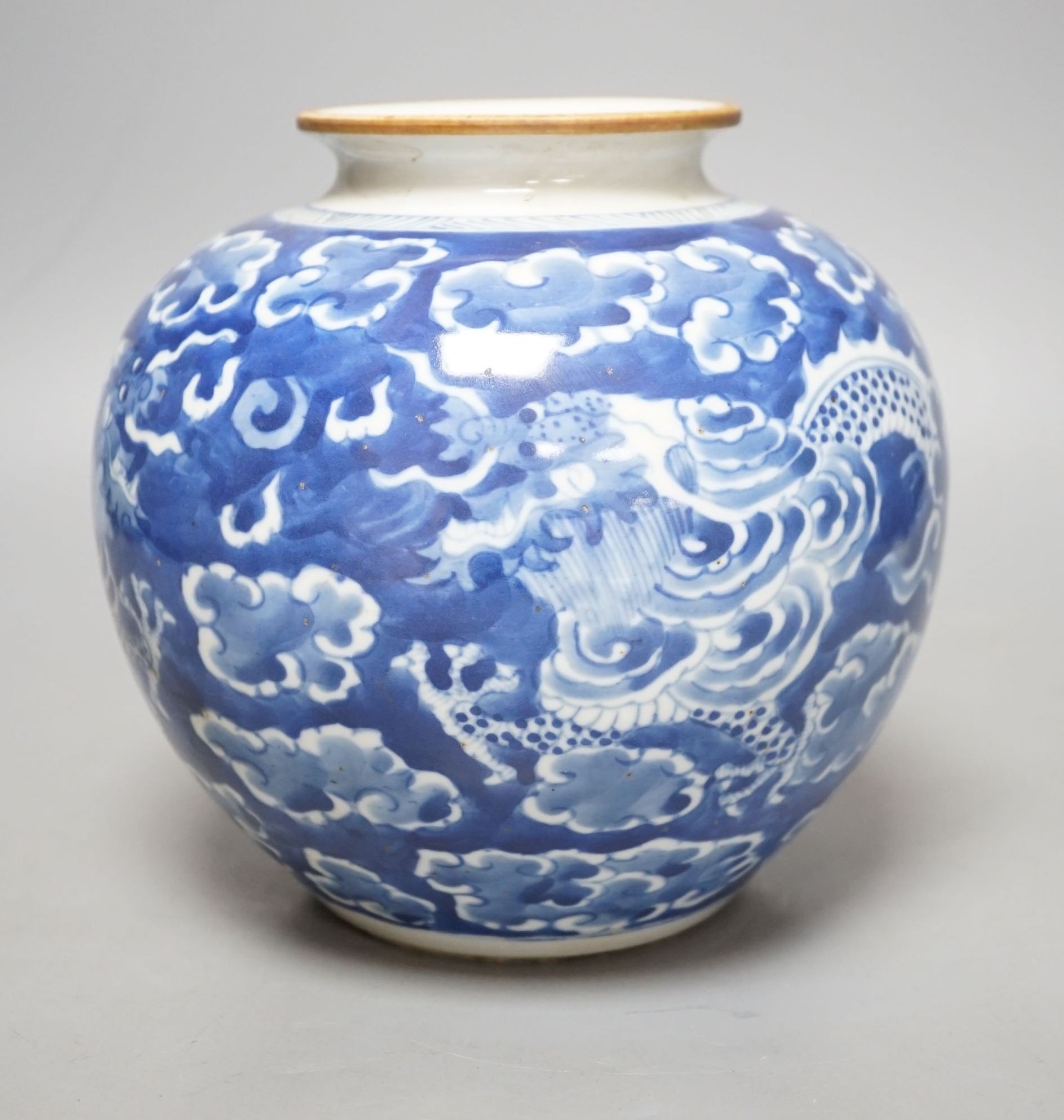 A Chinese blue and white ‘dragon’ globular vase, 17cms high.